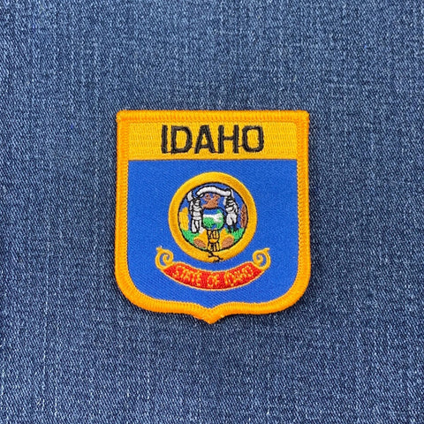 Idaho state patch on a blue denim background