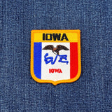 Iowa patch on a denim background