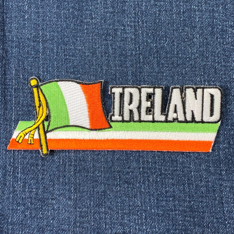 A patch featuring the flag of Ireland with a flagpole and the word 'IRELAND' at the bottom, on a denim background.