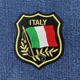 Embroidered patch with Italian flag and 'ITALY' text on a denim background