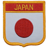 Patch with 'JAPAN' text and a red circle on a white background, bordered by yellow.