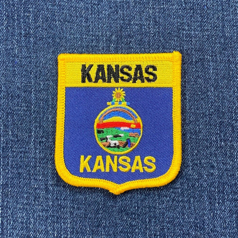 Kansas patch with state emblem on a denim background