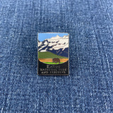 Pin with Katmai National Park and Preserve design on a denim background