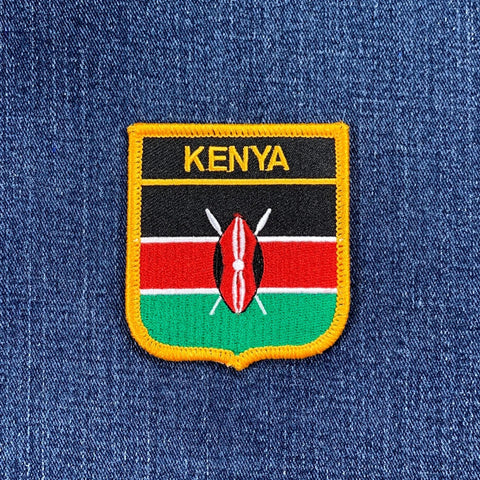 Kenyan flag patch on a blue denim background