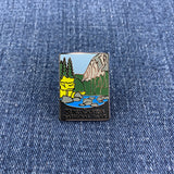 Pin with a scenic design of a kings canyon national park mountain and trees on a denim background