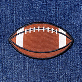 Football patch on a denim background