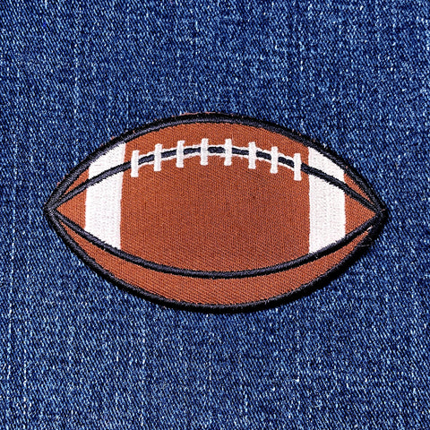 Football patch on a denim background