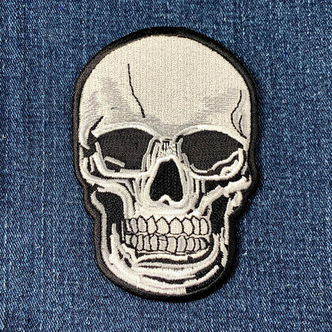 Skull patch on a denim background