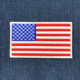 a large usa patch on a denim background