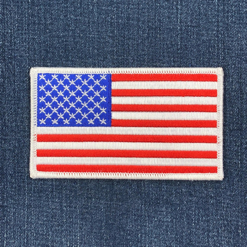 a large usa patch on a denim background