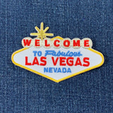 Embroidered patch of the Las Vegas sign on denim fabric