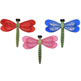 3 colorful dragonfly-shaped patches on a white background