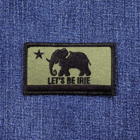 Patch with elephant design and 'Let's Be Irie' text on a blue denim background
