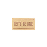 Microfiber patch with 'LET'S BE IRIE' text on a white background