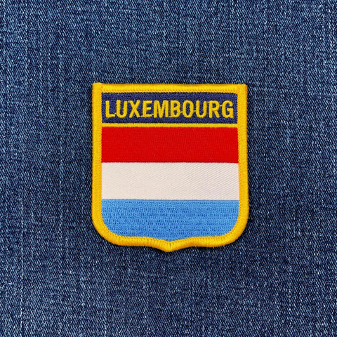 Luxembourg flag patch on a denim background