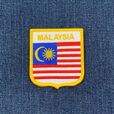 Malaysian flag patch on a denim background