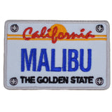 A patch with the design of a California license plate, labeled 'Malibu' and 'The Golden State', predominantly in blue, red, and yellow colors.