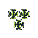 Three green and black cross-shaped patches on a white background