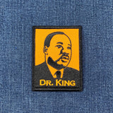Patch with a portrait of Dr. King on a denim background