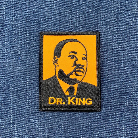 Patch with a portrait of Dr. King on a denim background