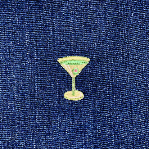 Embroidered martini glass patch on denim fabric