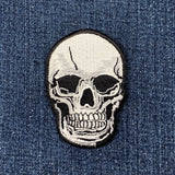 Skull patch on denim fabric