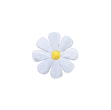 White flower-shaped patch with a yellow center on a white background