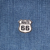 Route 66 patch on blue denim fabric