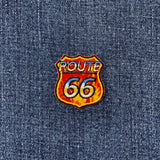 Route 66 badge on a denim background