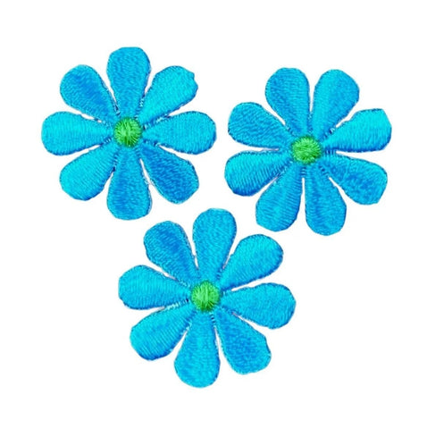 three blue and green daisy patches on a white background