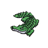 Green alligator patch on a white background