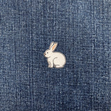Bunny-shaped patch on a denim background