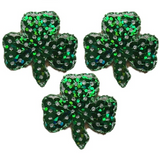 Three sequin clover applique patches on a white background