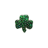 Green shamrock with sequins on a white background