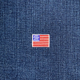 American flag patch on blue denim fabric