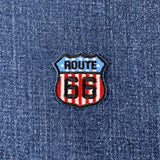 Route 66 patch on a denim background