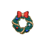 Embroidered Christmas wreath patch with a red bow on a white background