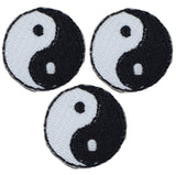 Three mini Yin Yang applique patches with white and black circles, intended for iron on application.