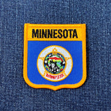 Minnesota patch on a denim background