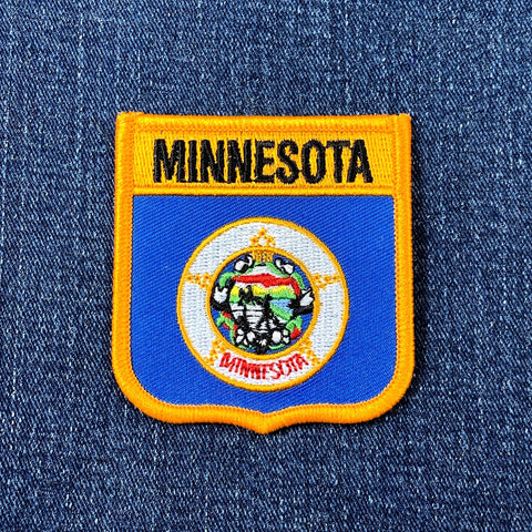 Minnesota patch on a denim background