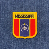 Mississippi state patch on a denim background