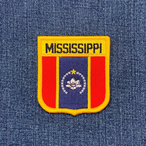 Mississippi state patch on a denim background