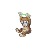 embroidered monkey hanging on a vine patch displayed on a white background