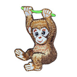 embroidered monkey hanging on a vine patch displayed on a white background