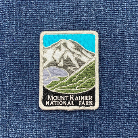 Mount Rainier National Park patch on a denim background