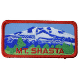 A rectangular embroidered patch featuring the image of Mount Shasta with a red border, and the text 'MT. SHASTA' across the bottom.