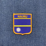 Nauru flag patch on a denim background