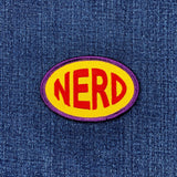 Patch with 'NERD' text on a denim background