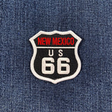Embroidered patch on denim fabric with 'New Mexico US 66' text