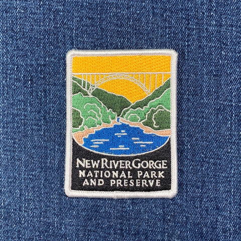 Embroidered patch of New River Gorge National Park and Preserve on a denim background
